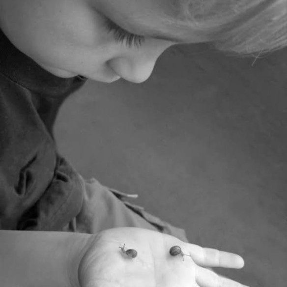 ©Jenny meehan Snails, boy looking at snails, black and white photography by Jenny Meehan 